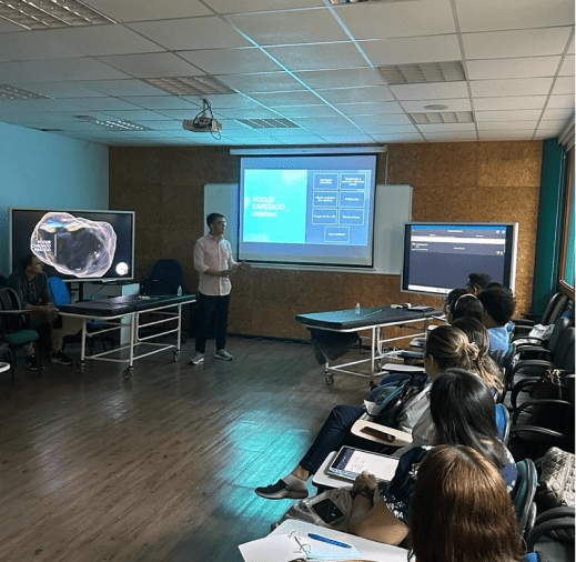 Ambassador reviewing objectives of Inteleos Foundation with clinicians in Brazil - wide shot